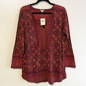 Split-neck Lucky tunic blouse.